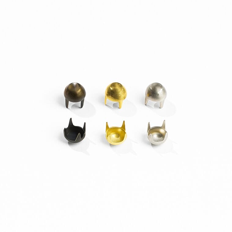 6.5mm cone nailheads a59 shown from top and bottom views, with four prongs for secure attachment to leather or fabric.