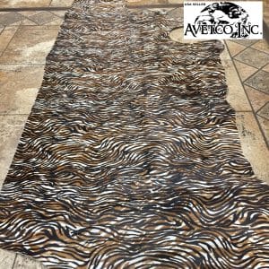 Avetco Inc-Cow Hair On Zebra Print Black with Brown 4 Small Cowhide with striking black and brown zebra print. Ideal for handbags, shoes, garments, upholstery, pillows, and décor. Natural, bold, and stylish finish.