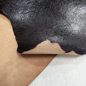 Crafted from premium cowhide, this double shoulder leather features an intricate elephant embossing pattern that adds a bold, exotic texture to any project
