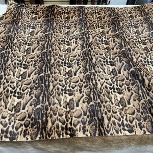 Panther-Beige 1 This beige cowhide with panther print adds a fierce, fashion-forward edge to any design. With bold black markings over soft beige tones, it's ideal for handbags, shoes, garments, furniture, pillows, and interior décor. Printed on premium hair-on cowhide and chrome tanned for durability and softness. Each hide is unique, perfect for custom statement pieces.