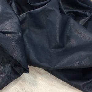 Navy Blue Buffalo Analine avetco leather (6) Buffalo Leather is a type of full-grain leather that has a rich and natural texture. The leather is soft to the touch and offers excellent comfort. It is also durable and has a consistent color, making it an exquisite option for upholstery, accessories, handbags, shoes, motorcycle apparel, and more. The unbuffed surface gives the material a matte appearance with a subtle shine, adding character to its otherwise subtle look. The Buffalo aniline collection is also skillfully prepared to provide excellent cutting yields.
