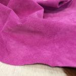 What is pig Leather Pig Leather collection - a range of leather products crafted from split suede material with a velvety texture. This leather is not only incredibly soft but also comes in a stunning array of colors that are sure to please any fashion enthusiast. The collection's versatile hues are perfect for creating a variety of atmospheres, from a dark and mystical ambiance to a pastel and dreamy feel. Whether you're looking to line a garment, create a handbag, or design footwear, this leather is sure to impress. With a whole hide ranging from 7-9 square feet and a thickness of 0.6-0.8 mm, you'll get to experience the beauty of a high-quality material that is both durable and stylish.