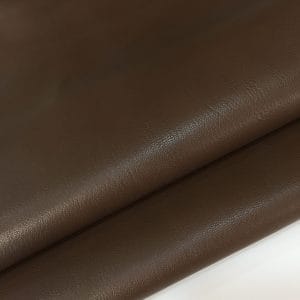 goatskin dark brown avetcoinc@ The Goatskin leather comes in a smooth finish that is very eye-catching, especially with the must-have authentic colors. The texture of the skin is silky smooth. This durable leather ranges from dark neutral colors, which can be used to create many different looks.