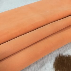 Tangerine goat suede leather hide