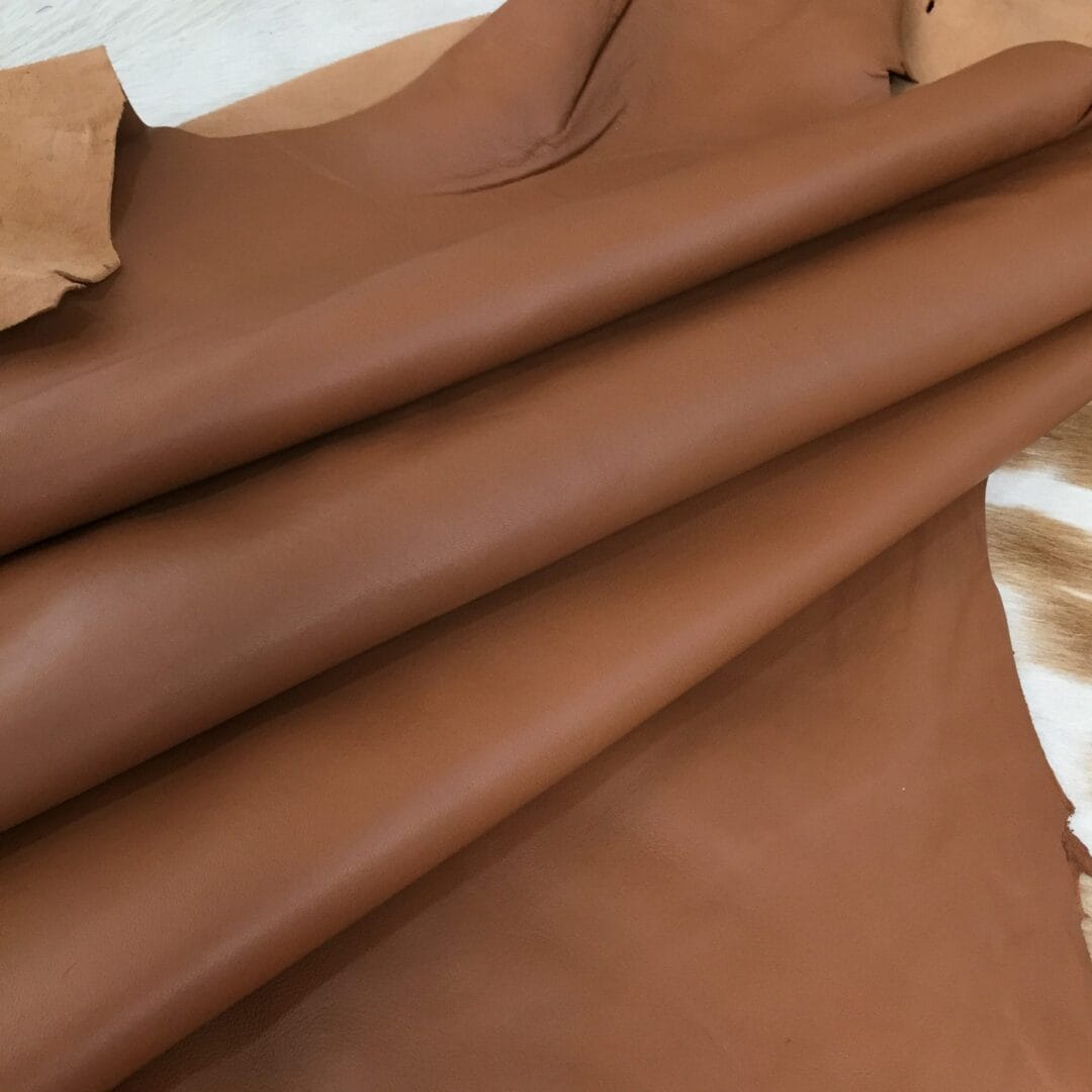 COGNAC LAMB Economy Grade Lambskin Leather is great for DIY Arts and crafts, Jewelry, Leather Earrings, Leather bracelets, Moccasins, Small Leather Goods, Patchwork.