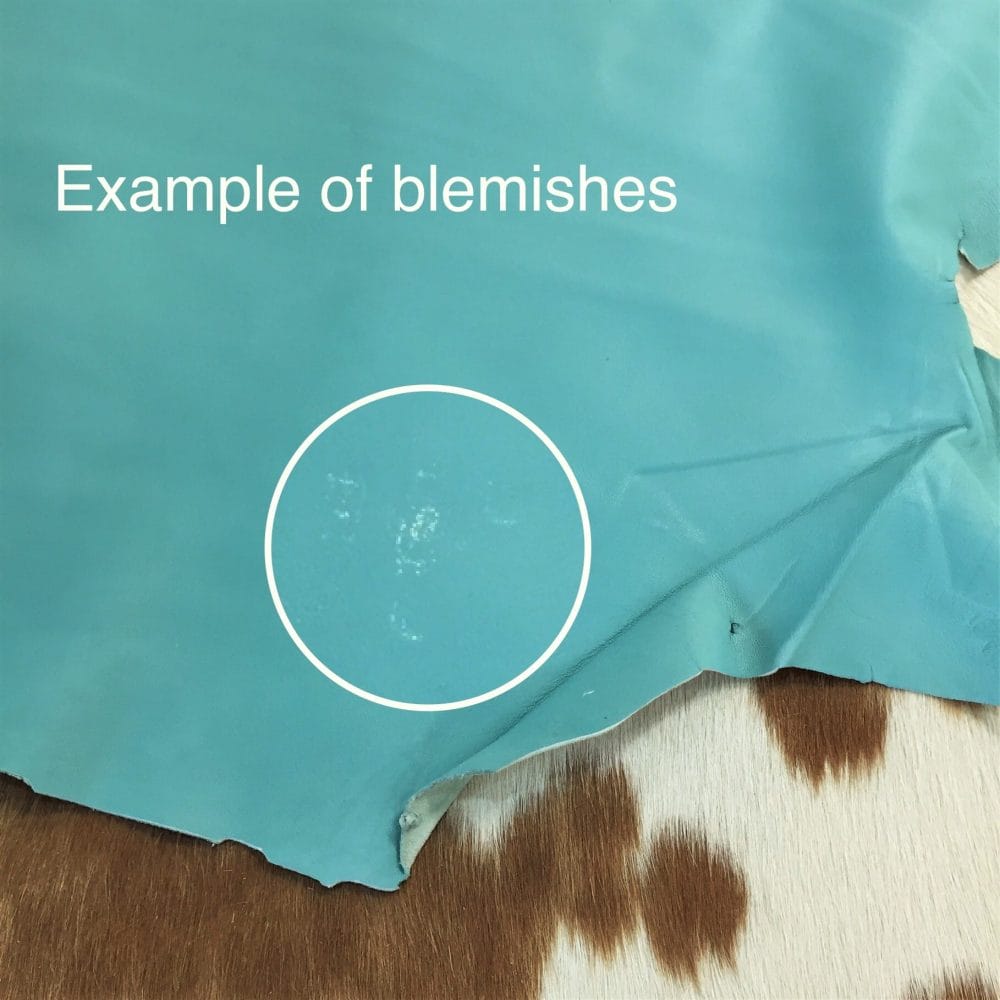 Avetco Inc Economy Lambskin Turquoise (6) Lambskin Leather Grade C is a type of leather that might have some imperfections, but they do not affect its performance. Instead, these flaws give it a unique appearance. The leather's raw material is sourced from sheep or lamb, and it weighs 2 oz. with a thickness of 0.7-0.9 mm. Furthermore, the economy grade Lamb leather may have uneven shade tone, dark spots, stretch marks, scarring, scratches, or a few holes. However, these flaws do not affect its performance. Instead, they give it a unique appearance that sets it apart from other types of leather.