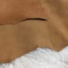 Doe (2) goat suede The Goatskin Suede Leather features a wonderful texture that is eye-catching and feels luxurious to the touch. Its versatility stems from a distinctive tanning method that involves gentle buffing, making it ideal for use in various items such as clothing, moccasins, lining, handbags, shoes, and accessories. Those who value timeless elegance and quality will undoubtedly find this leather worth the investment, as it guarantees utmost quality and worth through full hide pieces that typically range in size between 2-4 square feet and have a thickness of 3 oz (1.0-1.1mm). What is Goat Suede? Goat suede undergoes an extra finishing process that creates a velvety texture. This process involves buffing the flesh side of the hide, resulting in a soft and textured nap that feels wonderful to the touch.