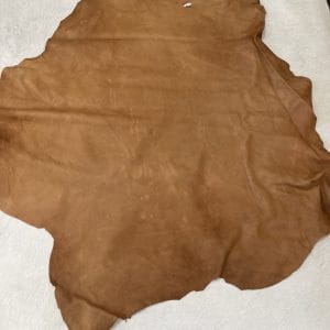 SL-103TAN Florence is full-grain lambskin leather with an aniline finish, showcasing natural blemishes and rich character through transparent dyes for a raw, authentic look.