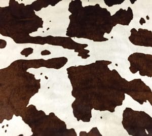 Cow Hair On Horse Print Chestnut This classic chestnut and white cowhide features a natural horse-print pattern, perfect for rustic or Western-inspired designs. Ideal for handbags, furniture, footwear, garments, pillows, and décor.