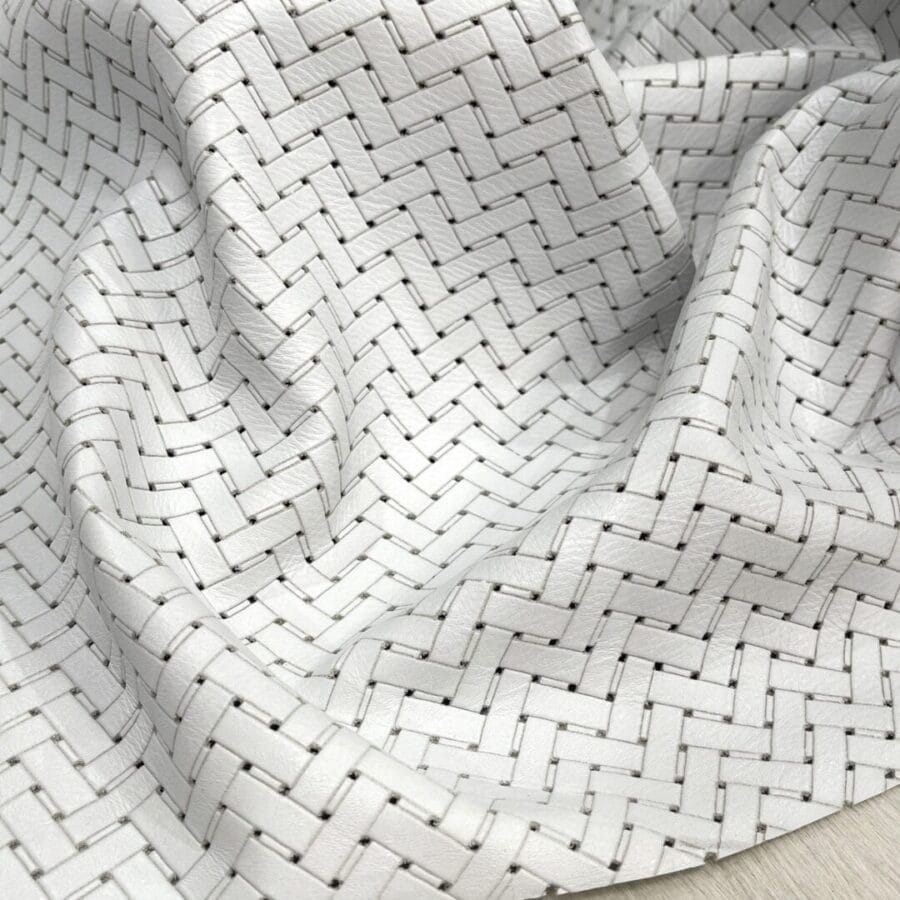 KP-215WHT.JPG The Gardner Collection is a European, washed, grain leather cowside hide with a chrome tannage finish. This collection has a diagonal zigzag pattern on the surface creating a woven-look, which is established using a laser printing technique. The Gardner collection has a wax finish on top, giving the leather a luscious shine adding a rich elegance to a casual style.