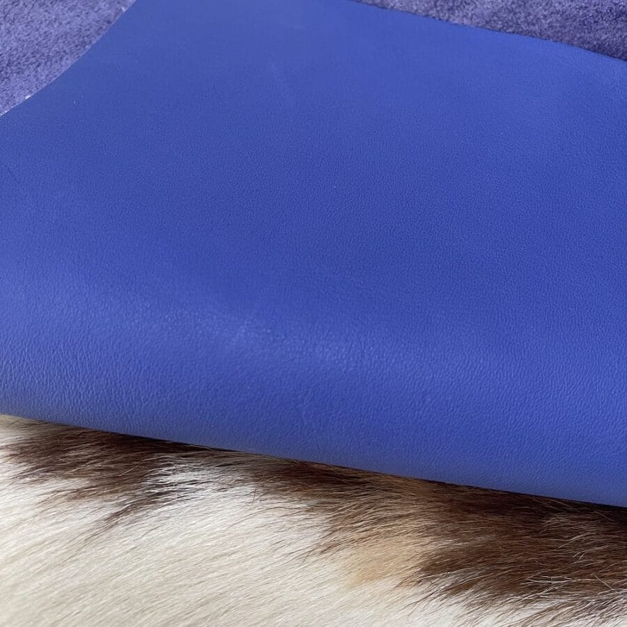 Blue Irish Milano Cow Leather 3 oz-Avetco Inc The Milano Cow Leather Collection is made of full-grain European leather produced from whole hides. This gives the leather a soft and luxurious finish on the surface, resulting in a subtle yet rich appearance. The collection is available in 48 complementary colors and is lightly pigmented and flexible, making it an excellent option for cutting. The Milano Collection is unbuffed and chrome-tanned, giving these leathers a smooth and elegant look.