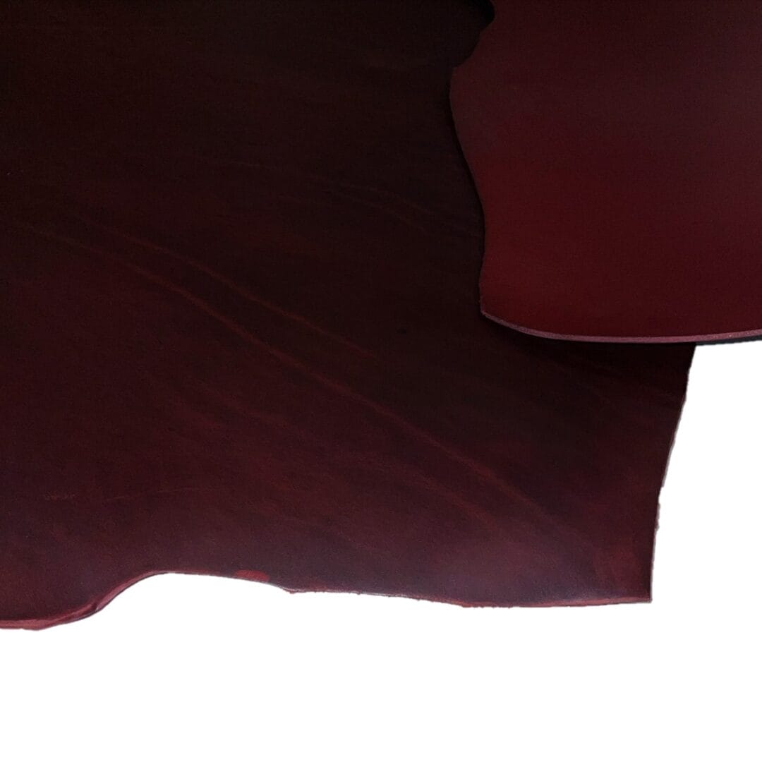 Latigo VEG TAN Burgundy Latigo Veg Tan Leather high quality, Grade A cowhide, 100% veg tanned , no harsh chemicals, durability and strength. Perfect for making saddles, reins, straps, belt, and wide range of leatherworking projects. Available Weight: 7/8 oz. (2.8-3.2 mm), 9/10 oz. (3.6-4.0 mm) Flesh side: Pasted AVG Hide Size: 22-25 Sq. Ft. Temper: Semi-Flexible Slight Pull Up effect (No Stretch) Tanned in Mexico