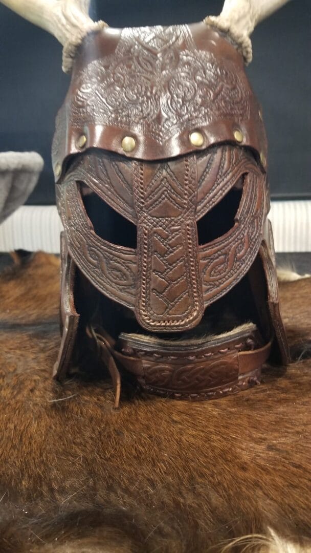 Tooled vambrace made with Avetco materials by Roosters Leather & Steel