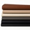 Milano-Neutrals and Earth Tones Collection-Avetco Stacked cow leather of Milano full-grain leather in a range of neutral and earthy tones including Caramel Café, Starfish, Whisper White, Charcoal Gray, and Black.-Avetco