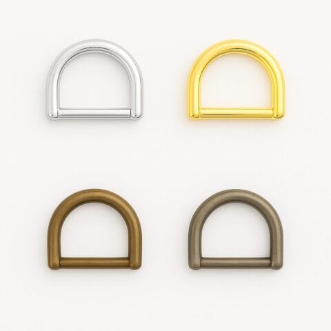 Y7456 D-Ring in four finishes: Nickel, 14k Gold, Antique Brass, and Antique Nickel on a white background.-Avetco