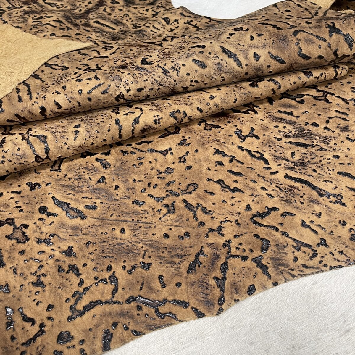 Fire Cliff embossed cow leather, tan side hide, 2/3 oz Stone Age Collection