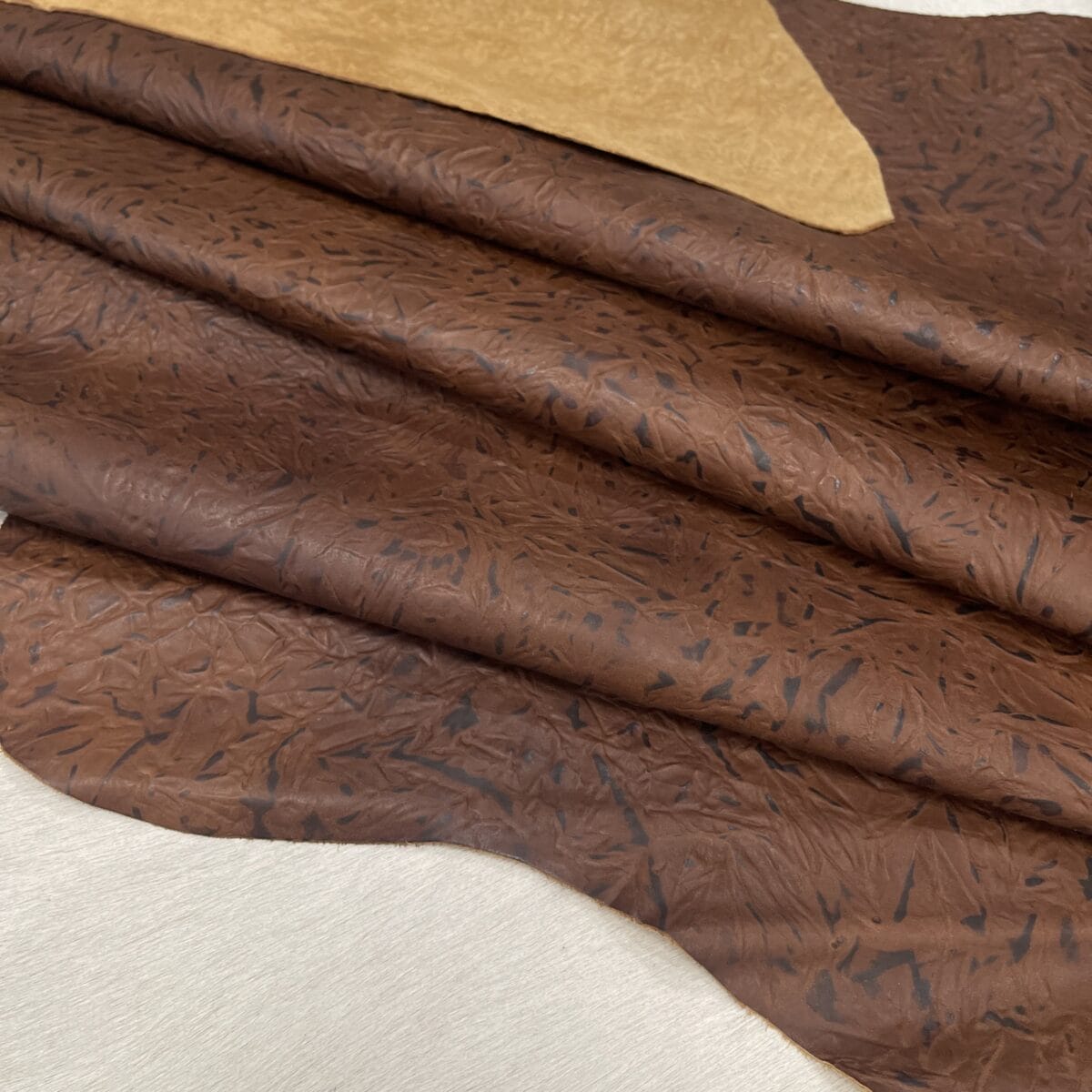 Flint Leaf embossed cow leather, tan side hide, 2/3 oz Stone Age Collection