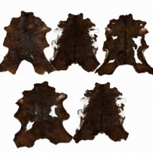 brown goat hair on Five dark brown cow hides with white patches laid flat on a white background, arranged in two rows of three and two.