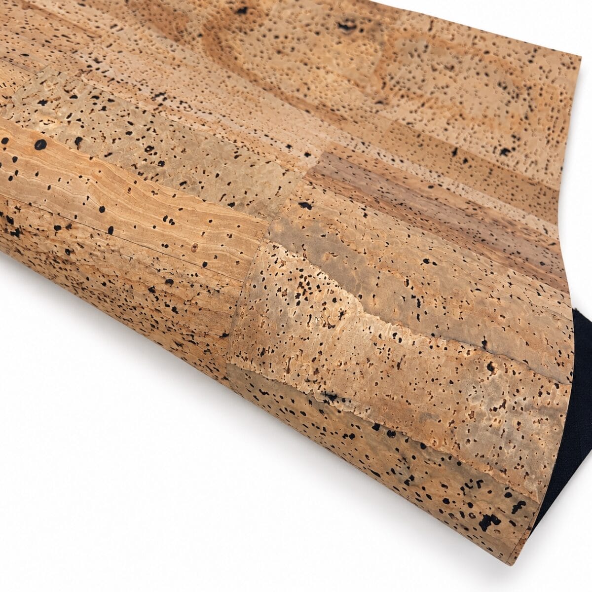 Cordoba 01 Natural Vintage cork fabric rolled Cordoba #01 Natural Vintage cork fabric rolled to show its flexible backing