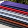 SL-115 Stretch Lamb SL-115 Stretch Lamb leather hides displayed in multiple colors including purple, navy blue, red, gray, black, brown, white, and green.