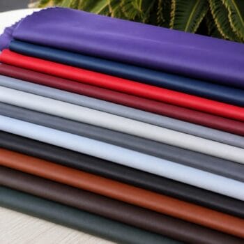 SL-115 Stretch Lamb leather hides displayed in multiple colors including purple, navy blue, red, gray, black, brown, white, and green.