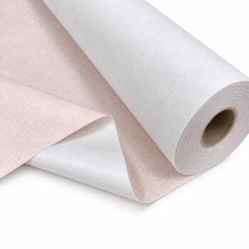 Roll of wallpaper with a pink-speckled side and white back, showing a cardboard core on a white background, close-up detail.