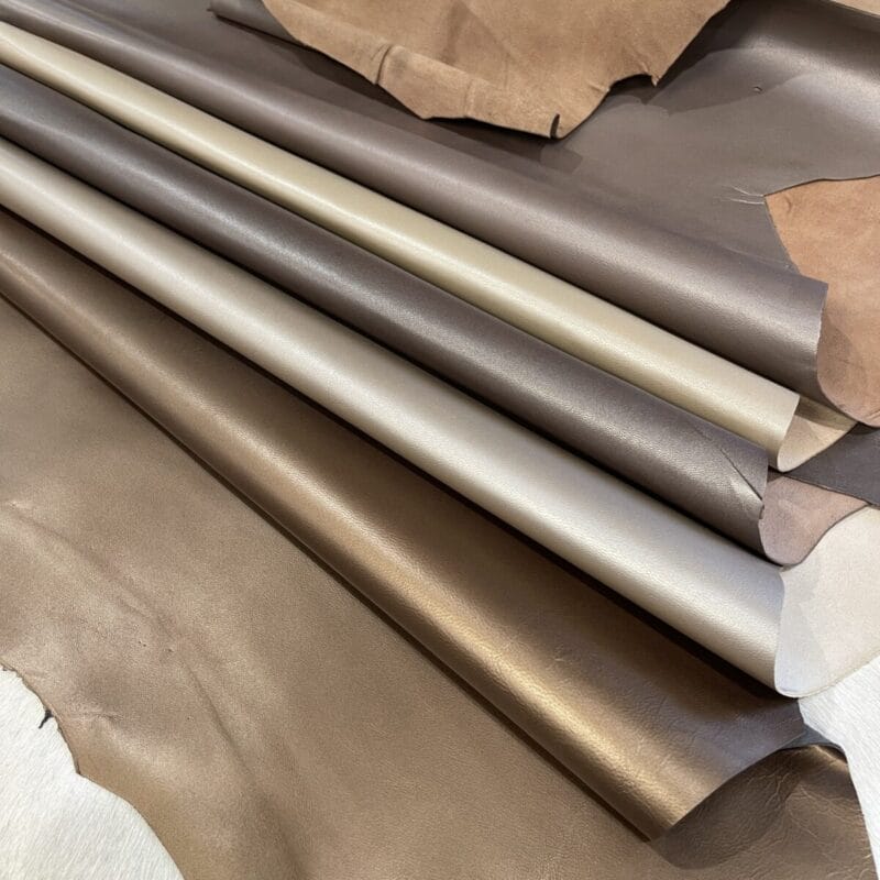 goat_leather Pearlized goatskin leather 3 oz hides rolled in bronze, pewter, taupe and platinum shades
