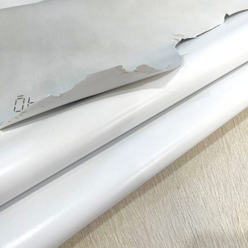 SL-202WHT White glazed goat kidskin leather hide, 2 oz, showing smooth glossy grain