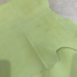 Economy goat suede leather hide in Lettuce Green with light pen number marks