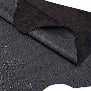 Black linen embossed cow leather showing the woven texture and suede back