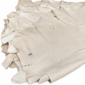 Natural pig leather hides stacked Natural pig leather hides stacked – tannery run half bundle
