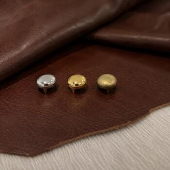 NH9 dome nailhead studs in nickel, gold and antique brass on brown veg-tan leather