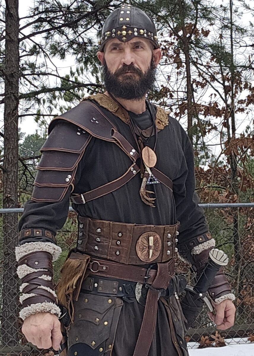 Studded harness vest made with Avetco materials by Roosters Leather & Steel