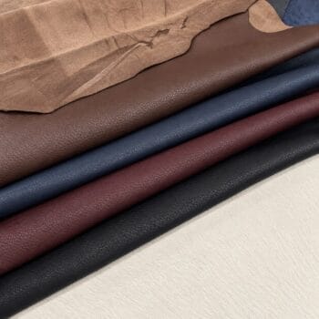 Signature Pebble Lambskin leather hides rolled in black, medium brown, navy and fudge