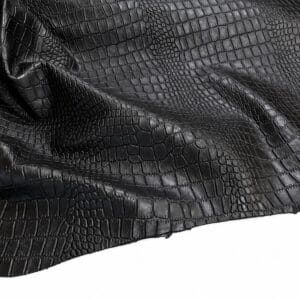 slalligo black Close-up of black crocodile-embossed leather fabric with a glossy texture.
