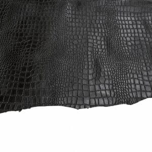 slalligo black Close-up of black crocodile-embossed leather texture with scale pattern.