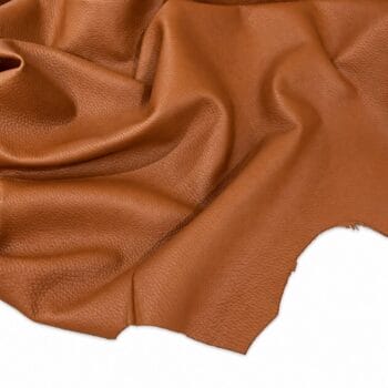 Cognac Pebble Lambskin Leather Floater Cognac pebble lambskin leather, Floater semi-veg lamb hide draped to show the grain