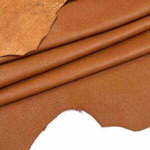 Cognac Pebble Lambskin Leather Floater detail Cognac pebble lambskin leather edge showing the grain side and suede back