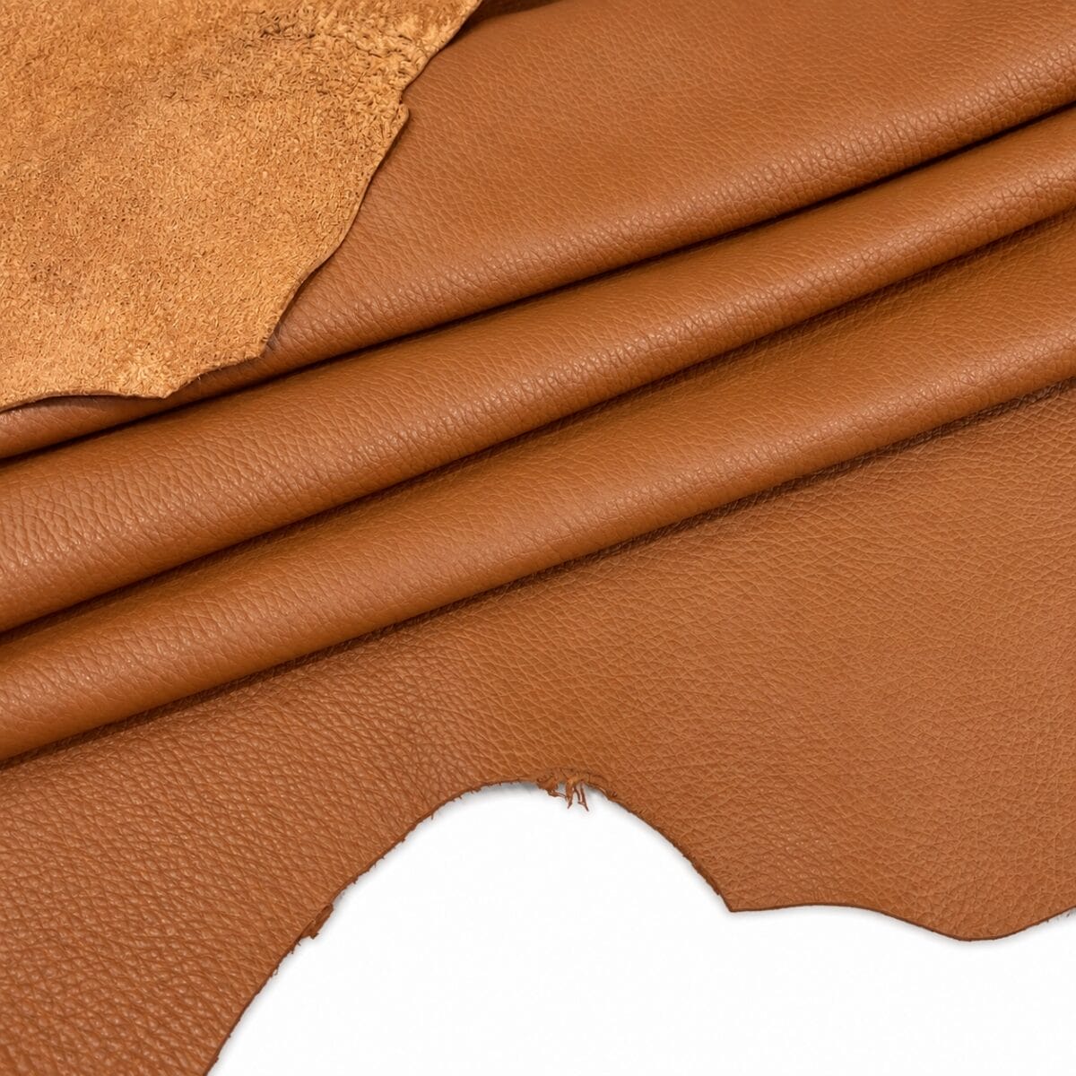 Cognac Pebble Lambskin Leather Floater detail Cognac pebble lambskin leather edge showing the grain side and suede back