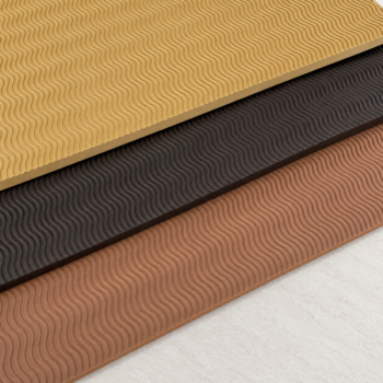 Stack of textured rubber stair treads in beige, dark brown, and terracotta with a wavy pattern showing alternating layers.